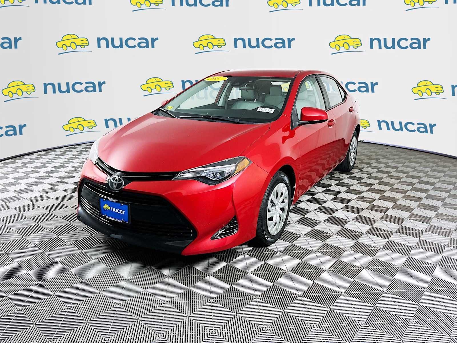 Used 2017 Barcelona Red Metallic Toyota LE image 3