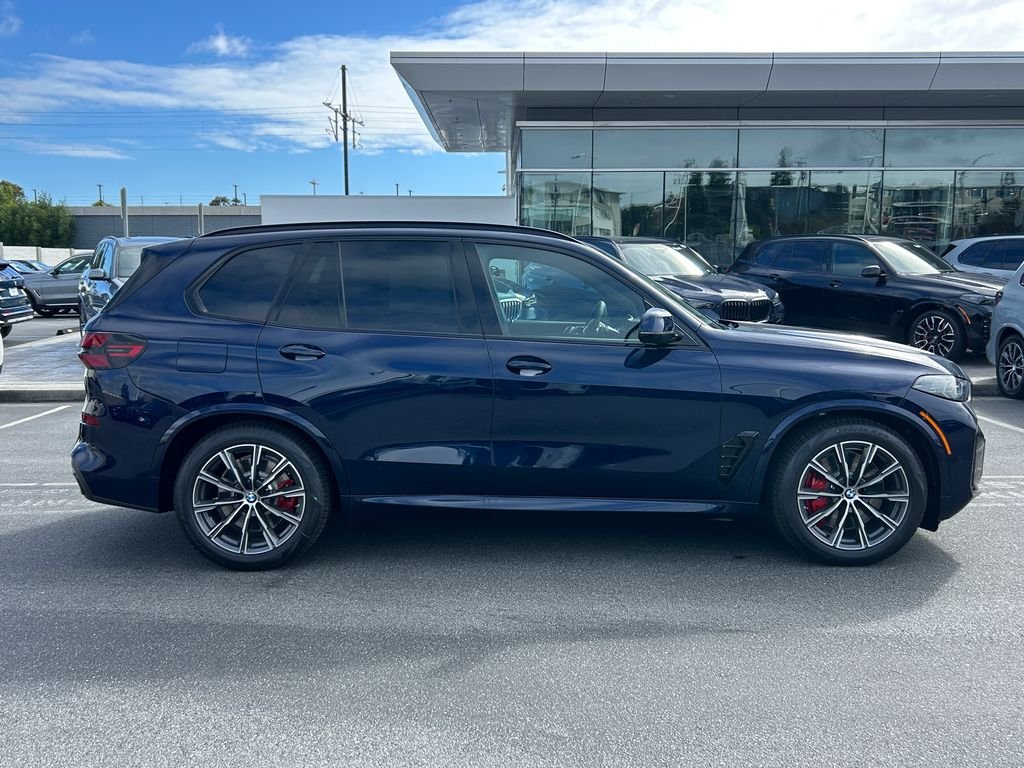 New 2026 Tanzanite Blue II Metallic BMW xDrive50e image 6