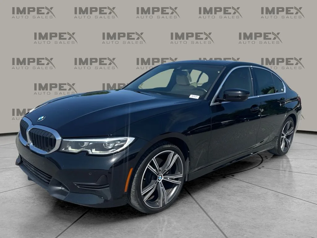 Used 2022 Black BMW 330i xDrive image 1