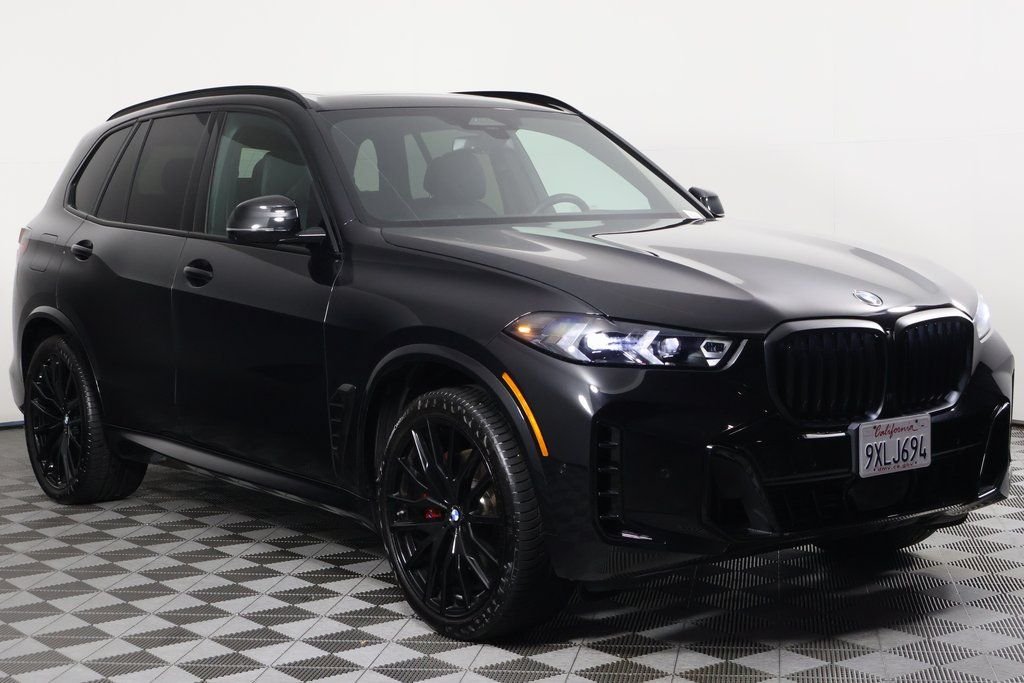 Certified Used 2026 Black Sapphire Metallic BMW sDrive40i image 3