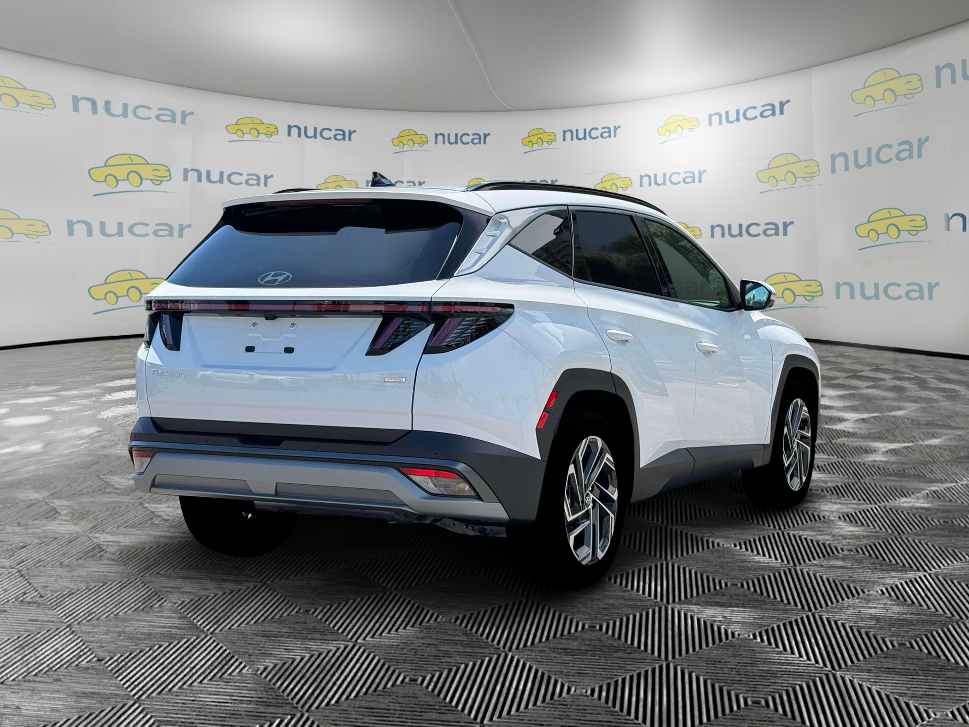 2026 Hyundai Tucson Limited in White at Nucar — photo 7