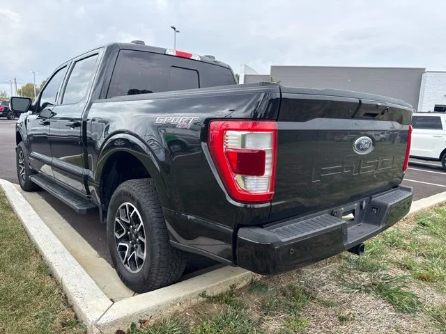 Used 2023 Black Metallic Ford Lariat image 4