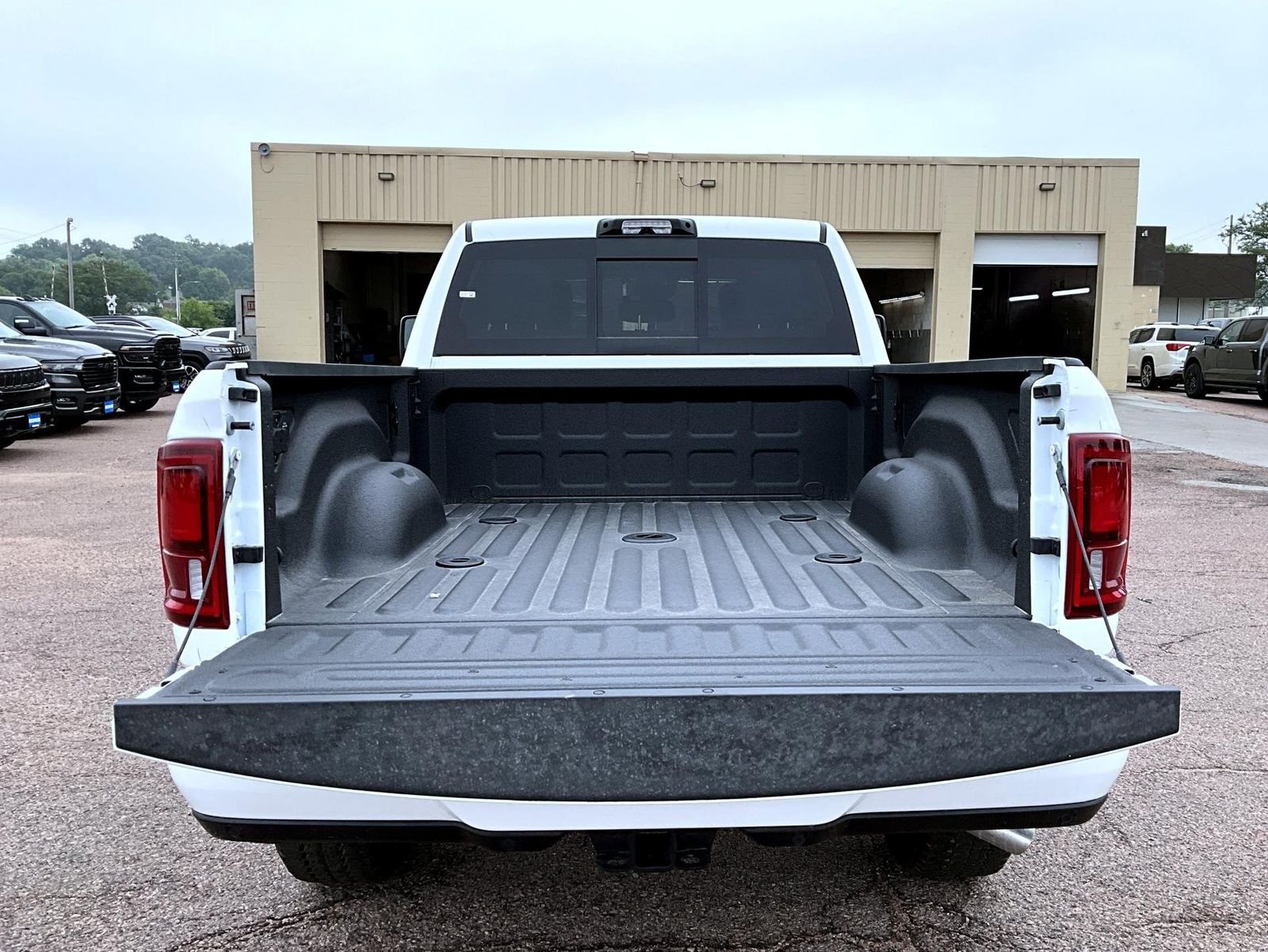 New 2026 Bright White Clear-Coat Exterior Paint RAM Laramie image 9