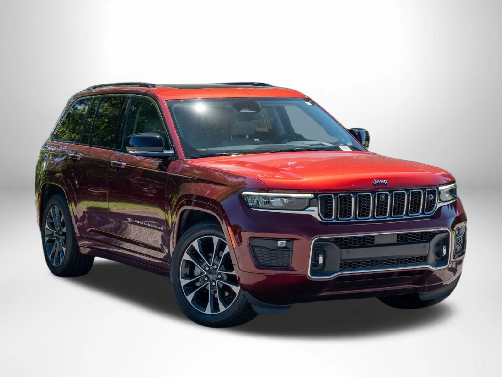 Used 2023 Velvet Red Pearlcoat Jeep Overland image 1