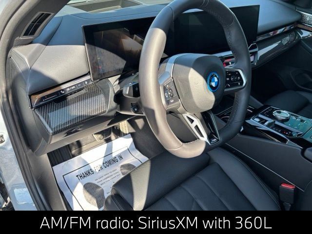 Certified Used 2026 Gray Metallic BMW 550e xDrive image 14