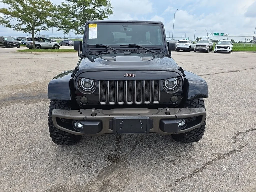 Used 2016 Black Jeep Unlimited Sahara image 2