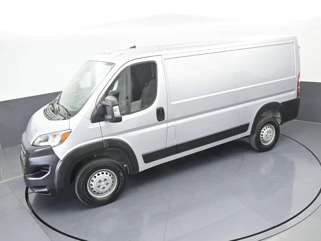 Used 2025 Bright Silver Clearcoat Metallic Ram Low Roof image 38