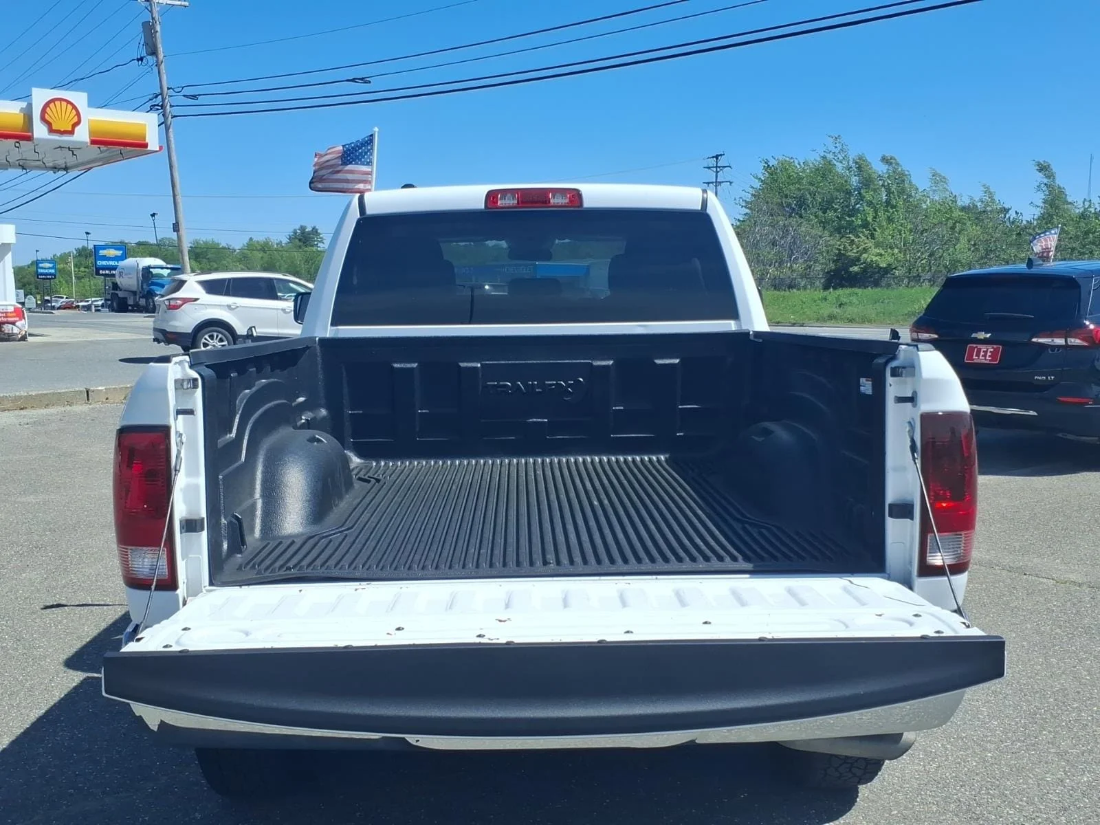 Used 2024 Bright White Clearcoat Ram SLT image 13