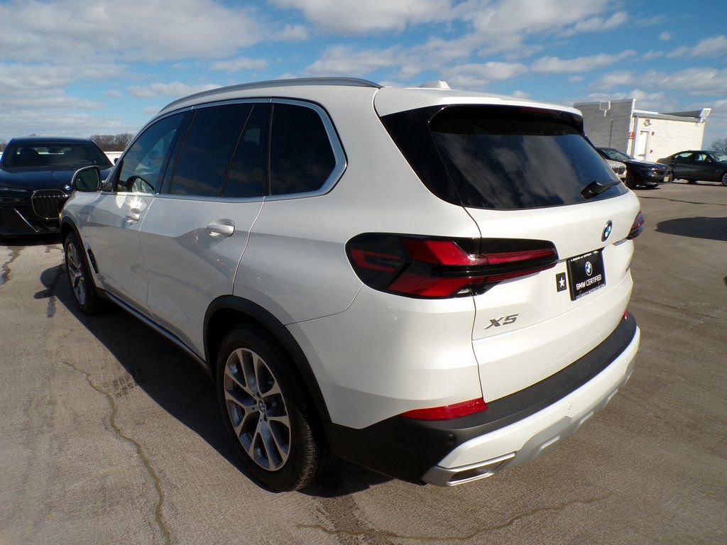 Certified Used 2026 Mineral White Metallic BMW xDrive50e image 4