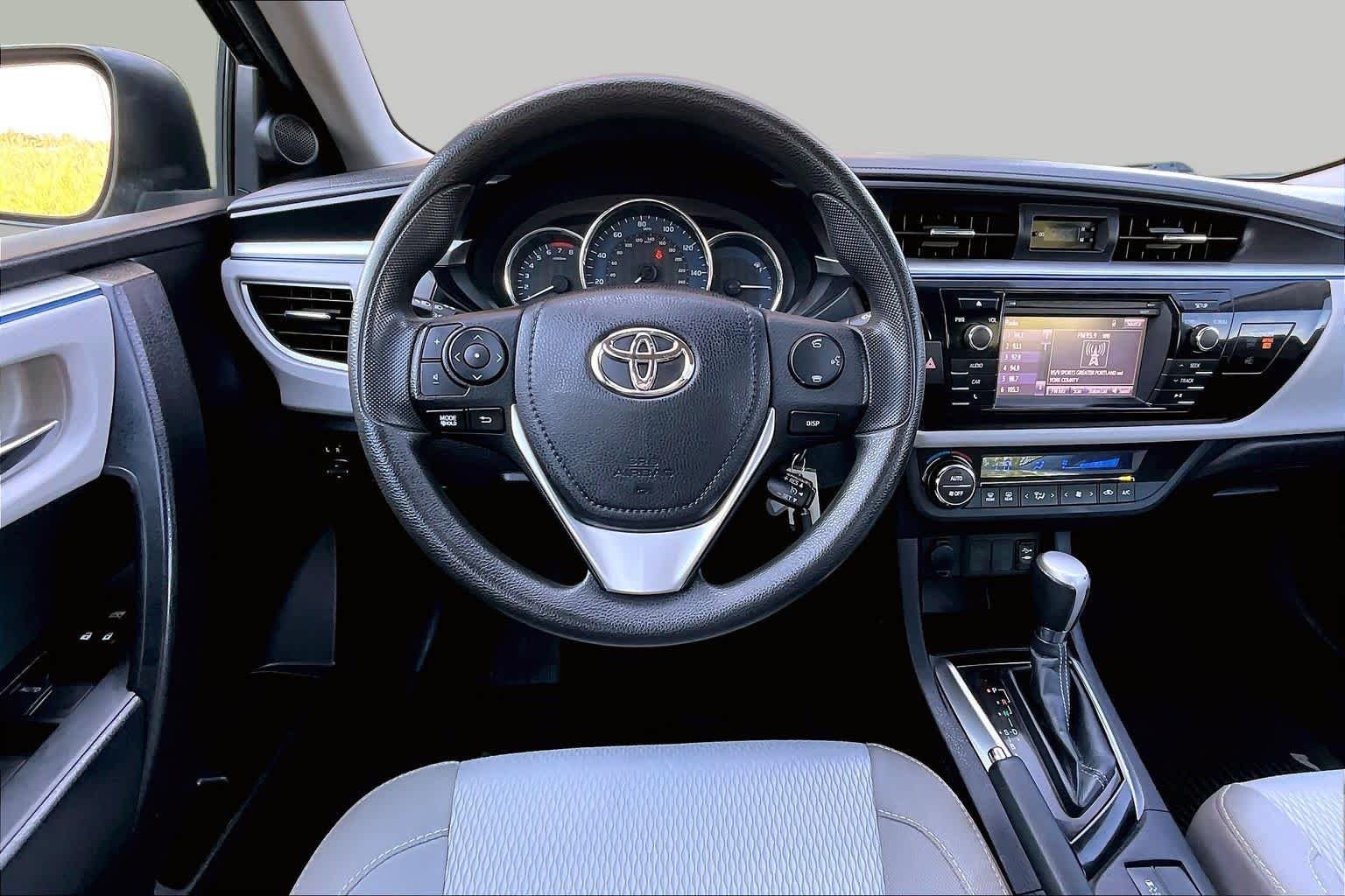 Used 2016 4Evergreen Metallic Toyota LE image 6