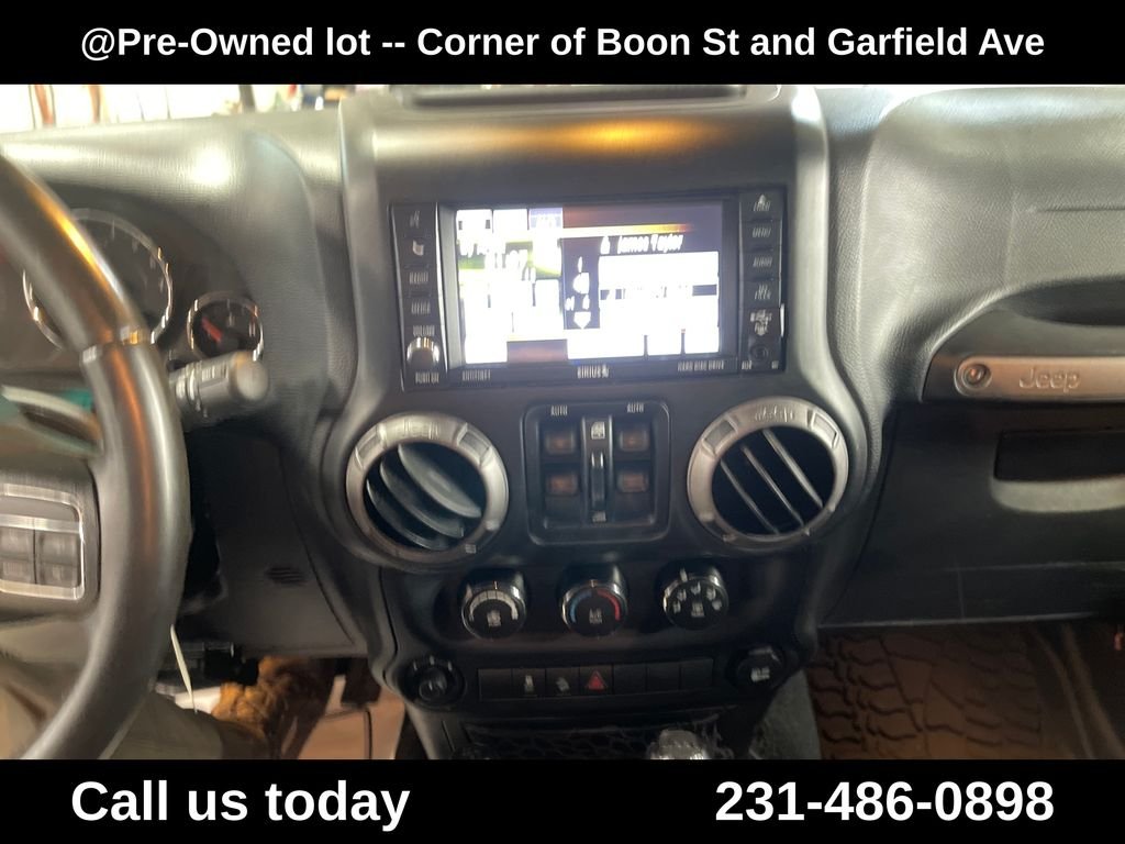Used 2015 Silver Jeep Unlimited Sport image 19