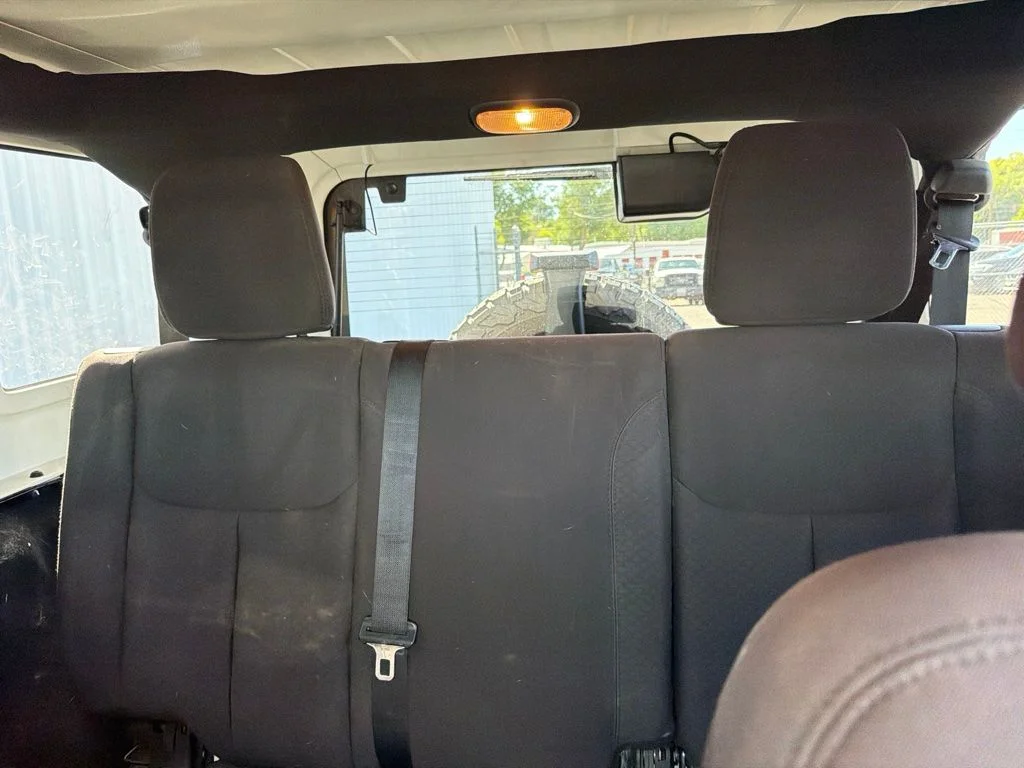 Used 2014 Black Clearcoat Jeep Unlimited Sport image 17