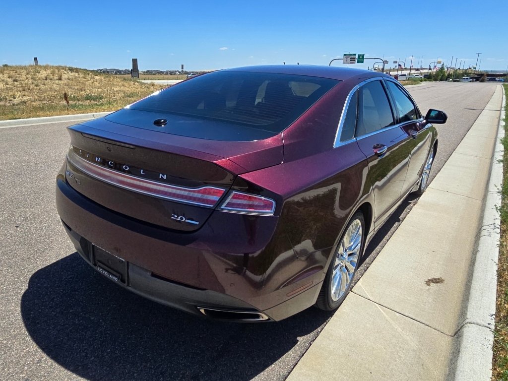 Used 2013 Ruby Red Metallic Tinted Clearcoat Lincoln Base image 5