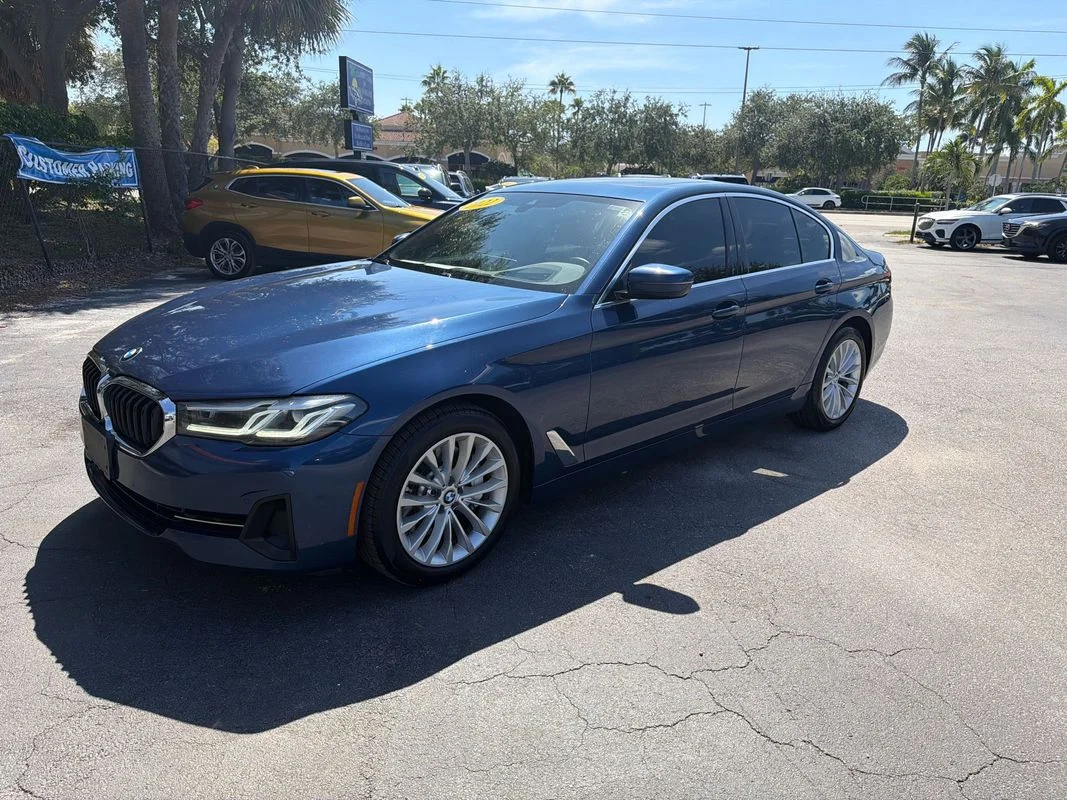 Used 2022 Blue BMW i xDrive image 1