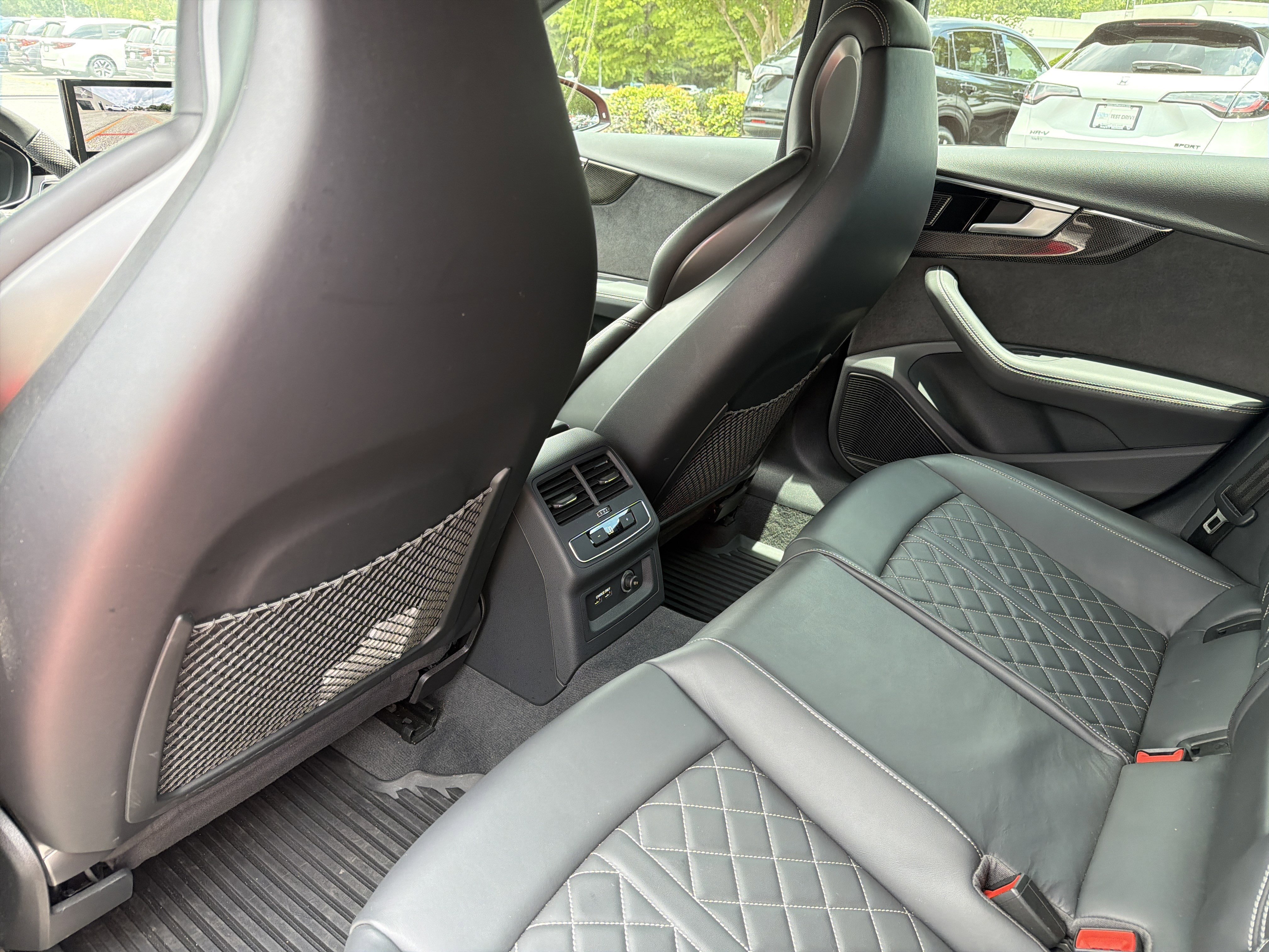 Used 2024 Progressive Red Metallic Audi Premium Plus image 20