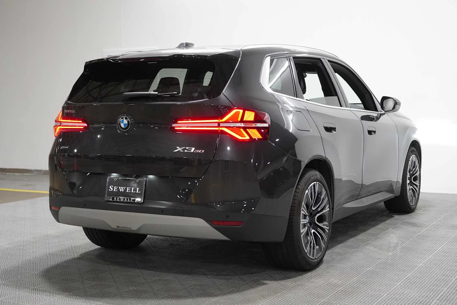 Used 2025 Dark Graphite Metallic BMW 30 xDrive image 13