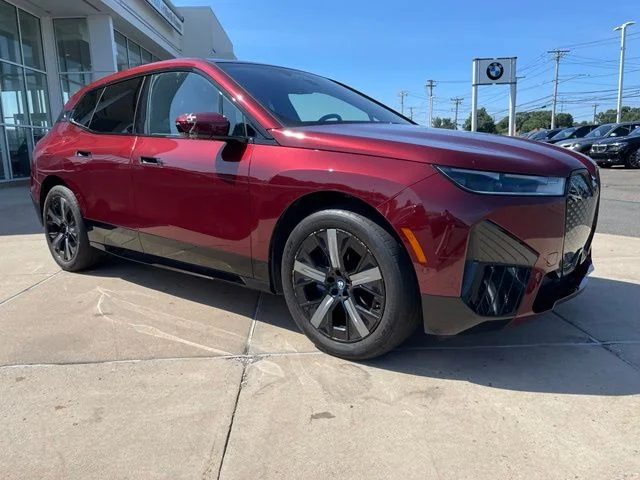 Certified Used 2024 Red BMW xDrive50 image 1
