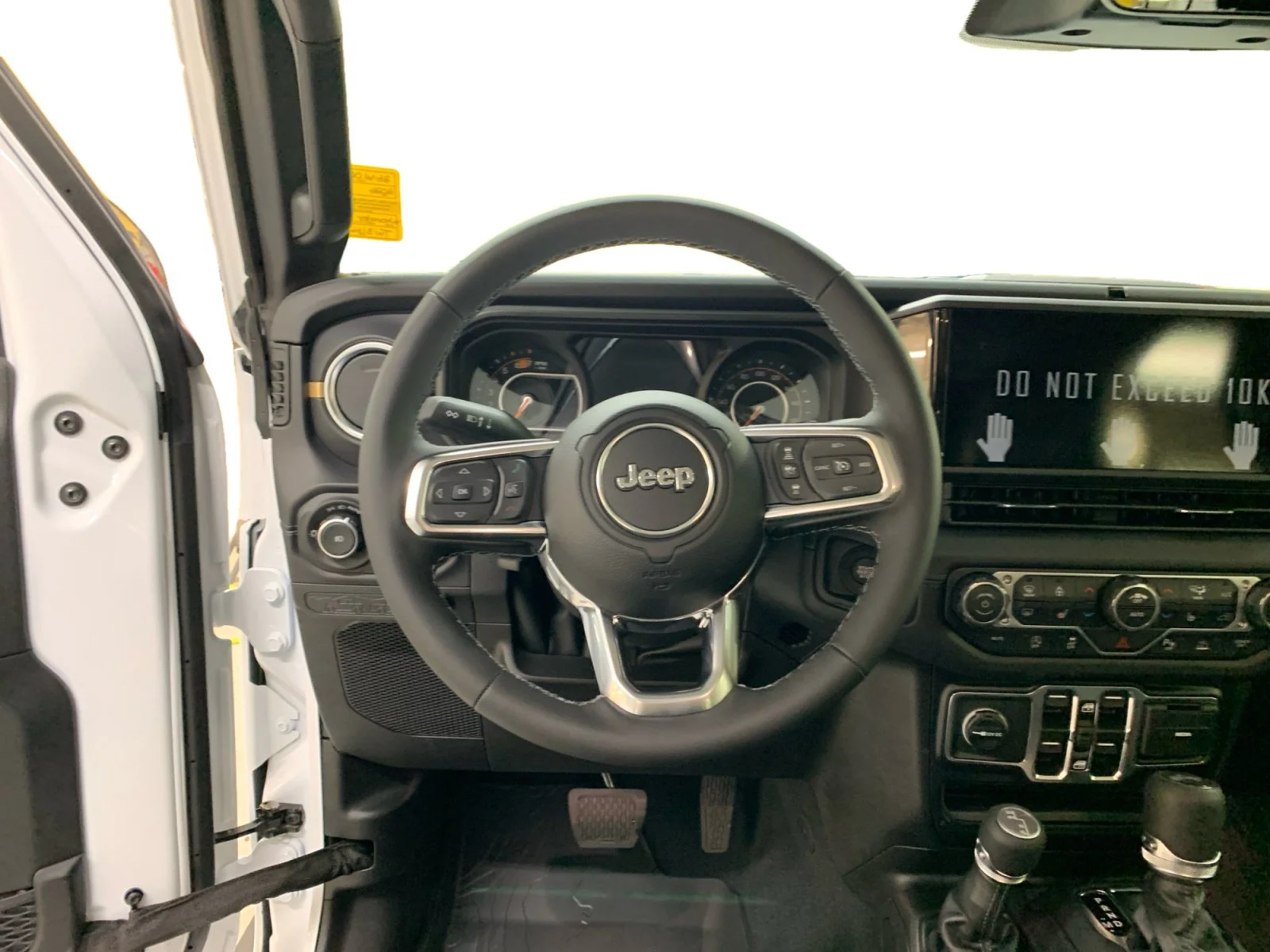 New 2026 Bright White Jeep Sahara image 11