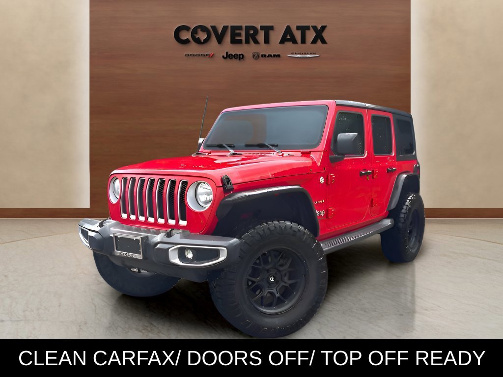 Used 2019 Red Jeep Unlimited Sahara image 1