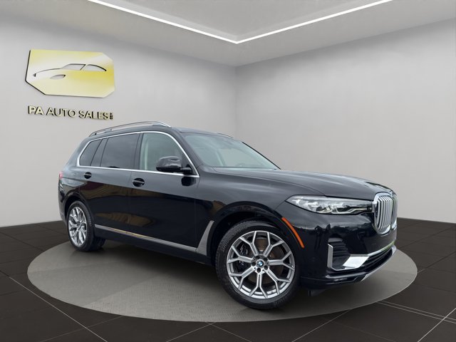 Used 2021 Black Sapphire Metallic BMW xDrive40i image 1