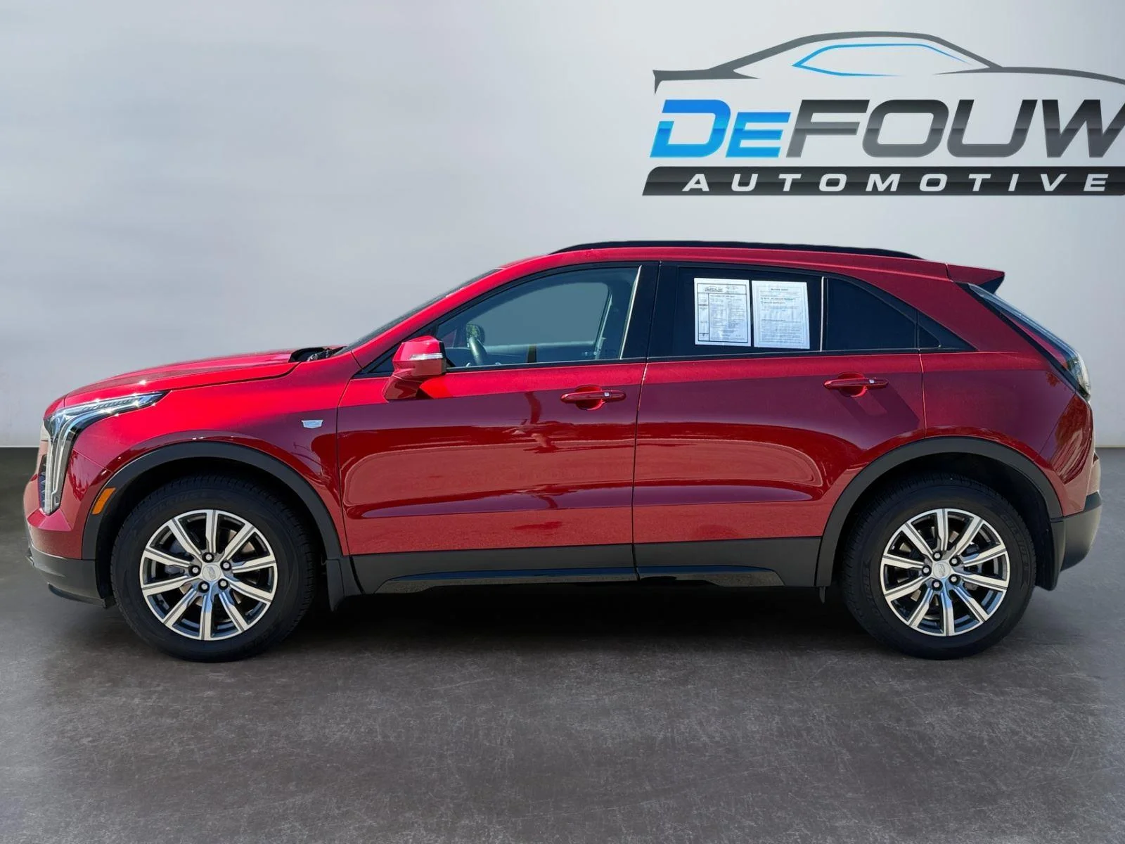 Used 2023 Radiant Red Tintcoat Cadillac AWD Sport image 6