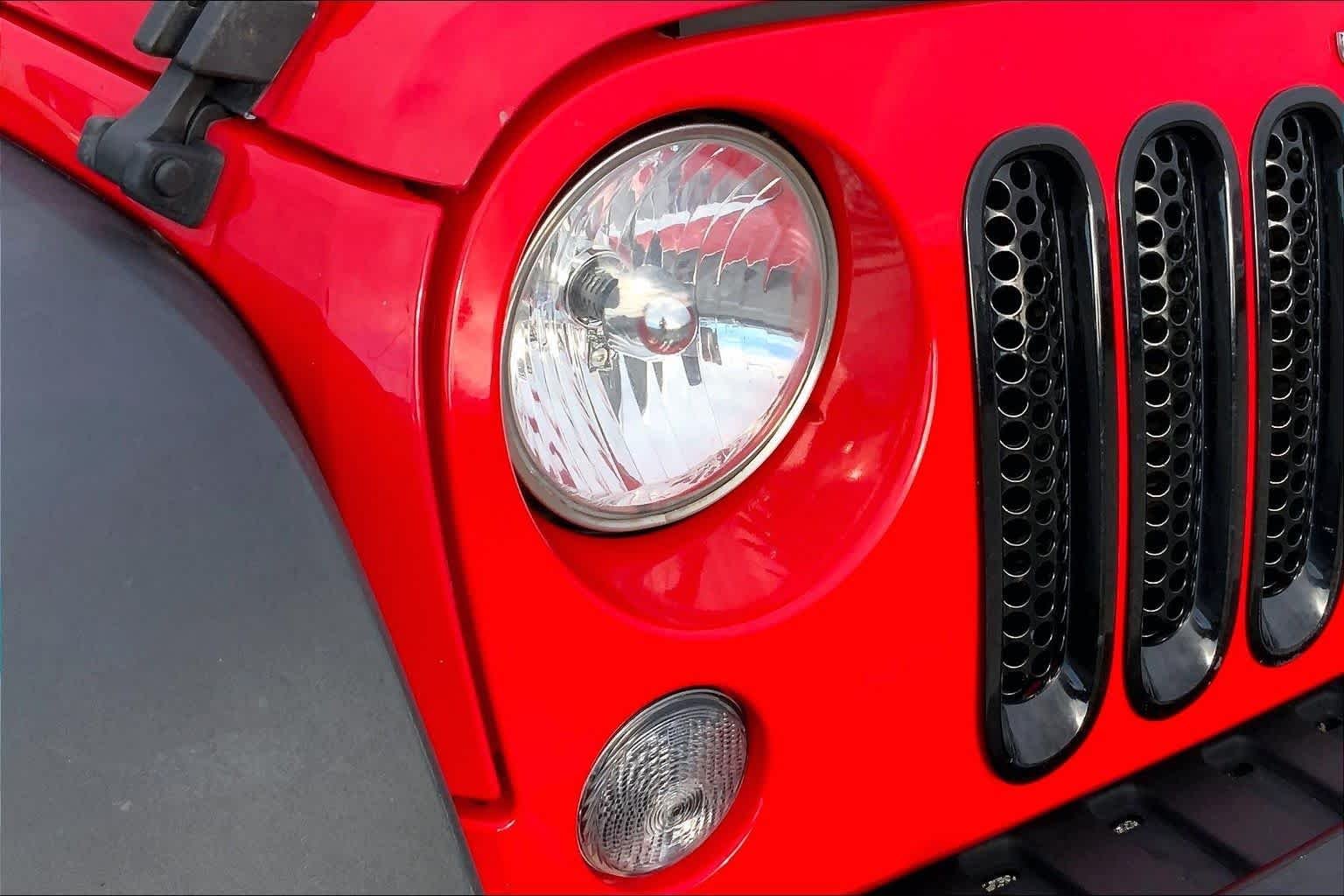 Used 2016 Firecracker Red Clearcoat Jeep Sport image 23