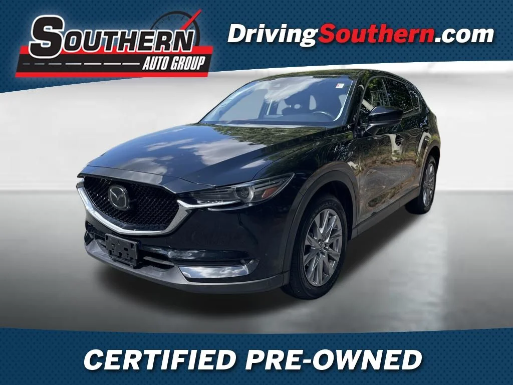 Used 2019 Black Mazda Grand Touring image 1