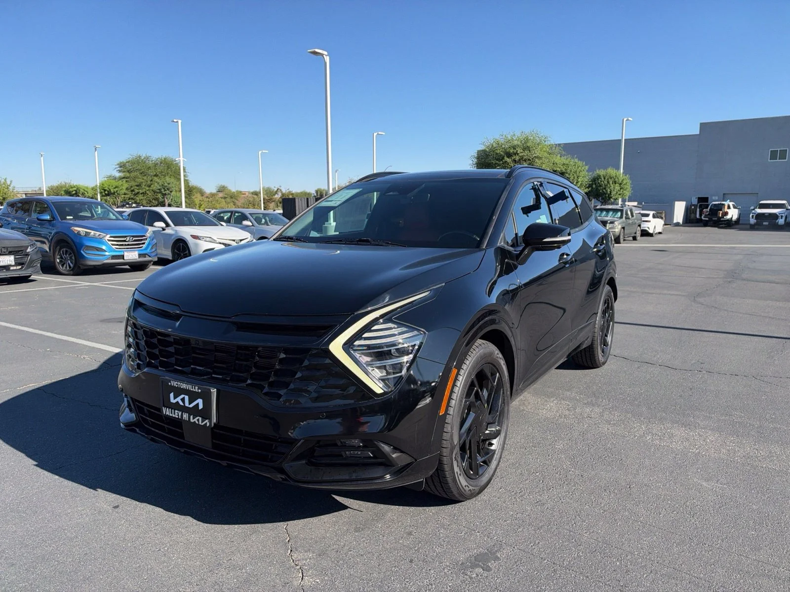 Used 2023 Ebony Black Kia SX-Prestige image 3
