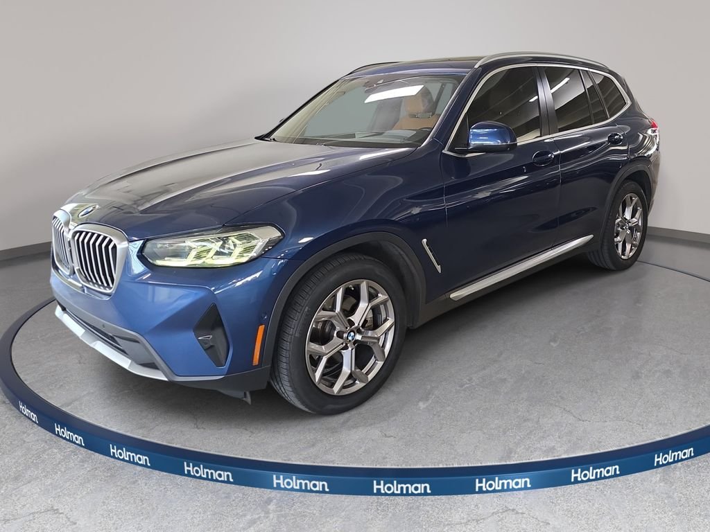 Used 2022 Phytonic Blue Metallic BMW sDrive30i image 1
