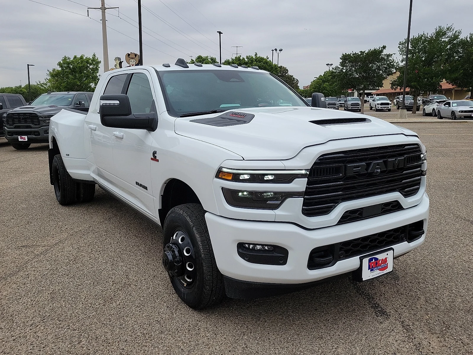 New 2026 PW7 Bright Whit Ram LARAMIE MEGA CAB 4X4 6