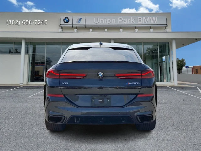 Used 2022 Black Sapphire Metallic BMW M50i image 5