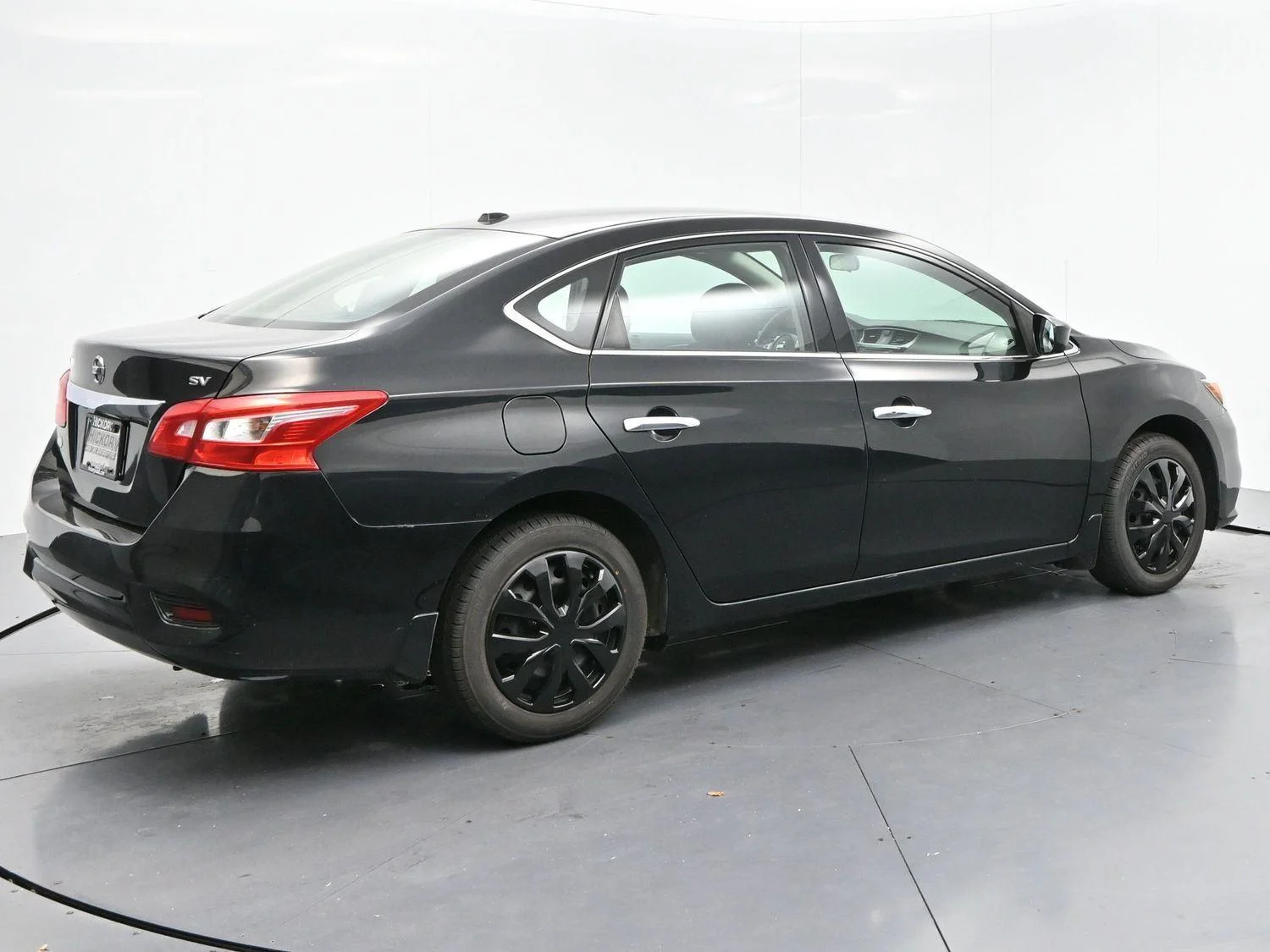 Used 2017 Super Black Nissan SV image 7