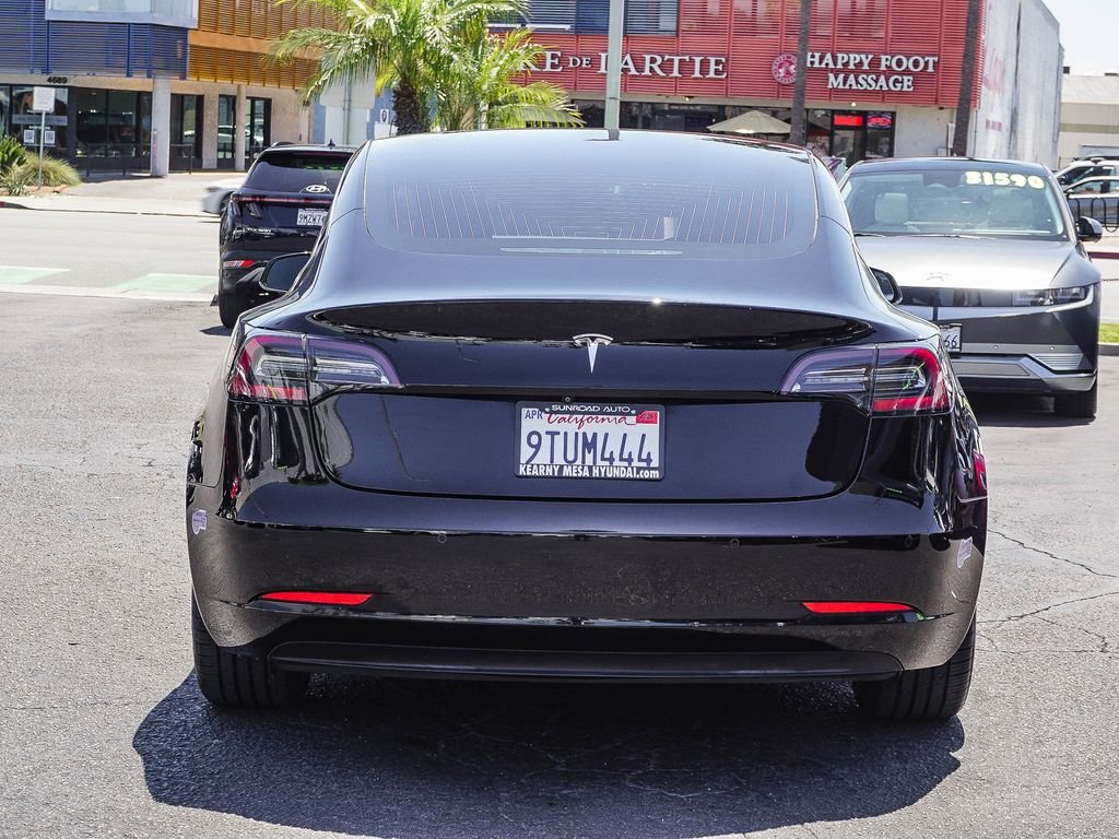 Used 2019 Solid Black Tesla Standard Range Plus image 4