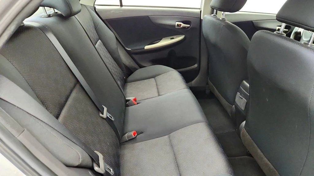 Used 2010 Classic Silver Metallic Toyota 4dr Sedan Manual S w/ Power Moonroof & 16