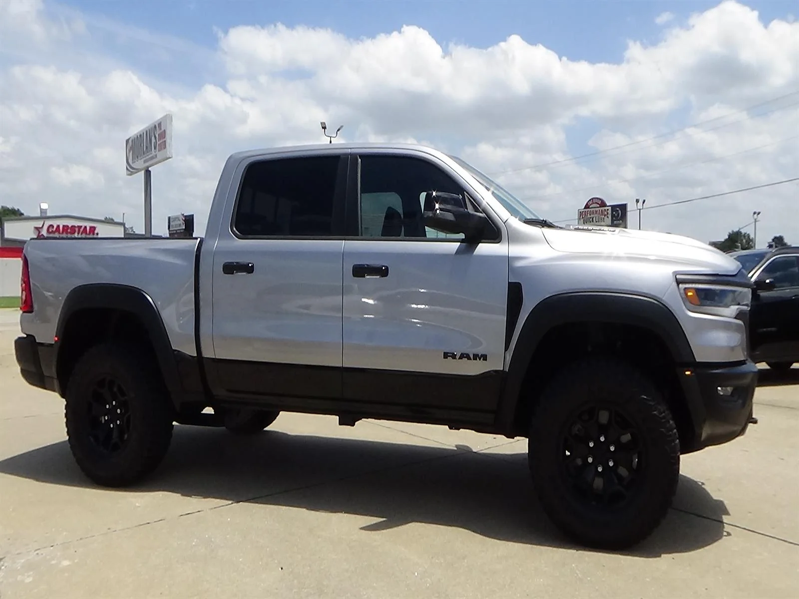 Used 2025 Billet Silver Metallic Clear Coat/Diamond Black Cr RAM RHO image 5