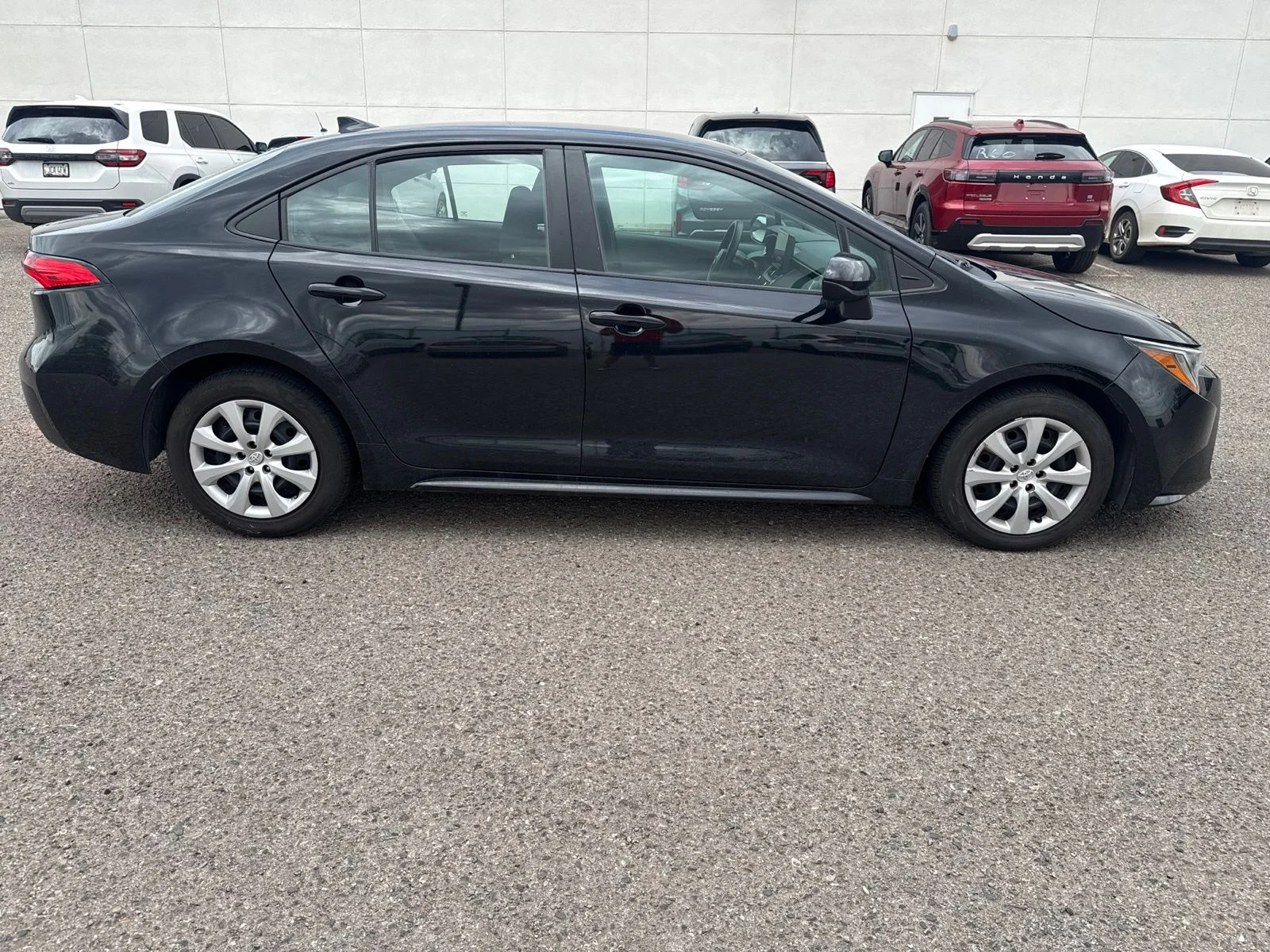 Used 2024 Black Toyota LE image 6
