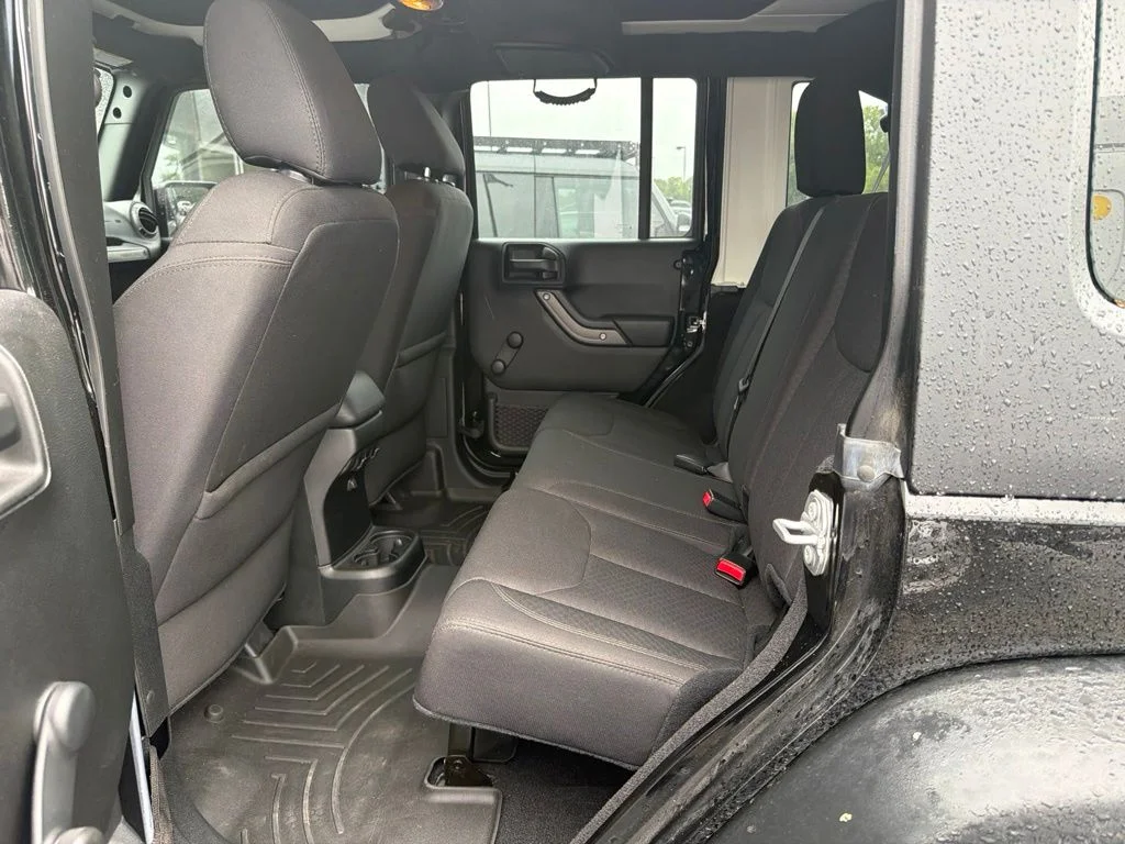 Used 2017 Black Jeep Unlimited Sport image 9