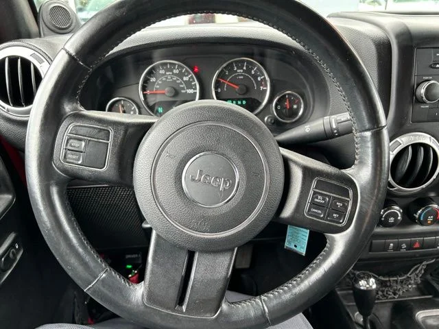 Used 2014 Red Jeep Unlimited Sahara image 25
