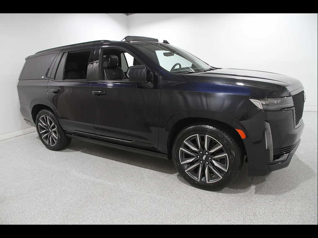 Used 2022 Dark Moon Blue Metallic Cadillac Sport Platinum image 1
