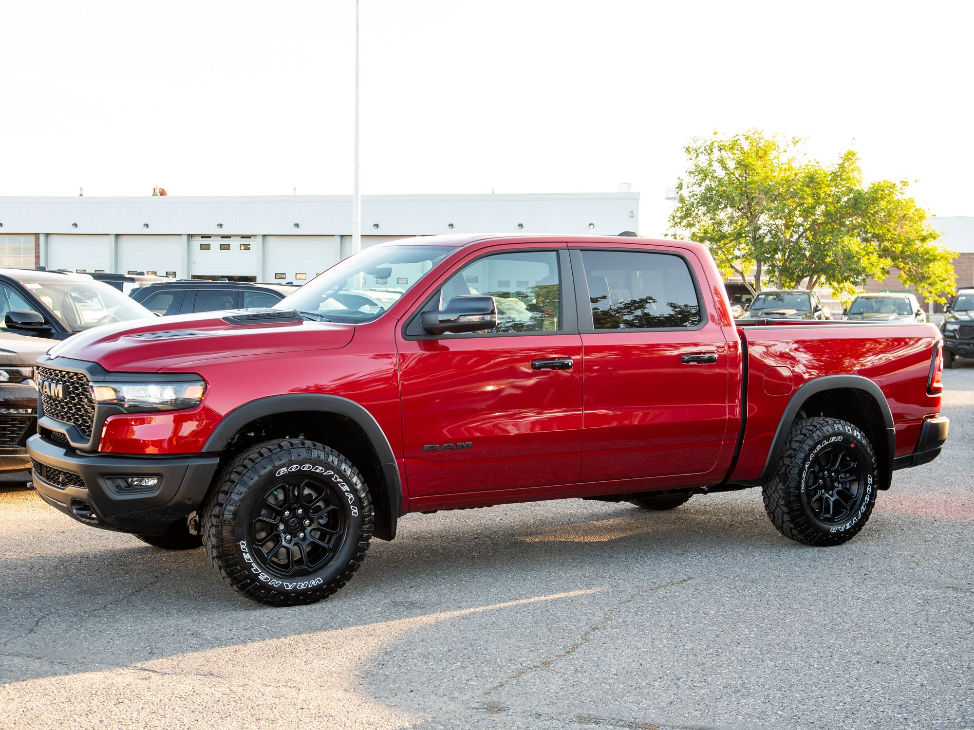 New 2026 Red RAM Rebel* Crew Cab 4x4, Pano Sunroof, 33 Inch A/T Tires, Passenger Screen image 4
