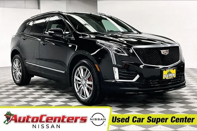 Used 2024 Stellar Black Metallic Cadillac Sport image 1