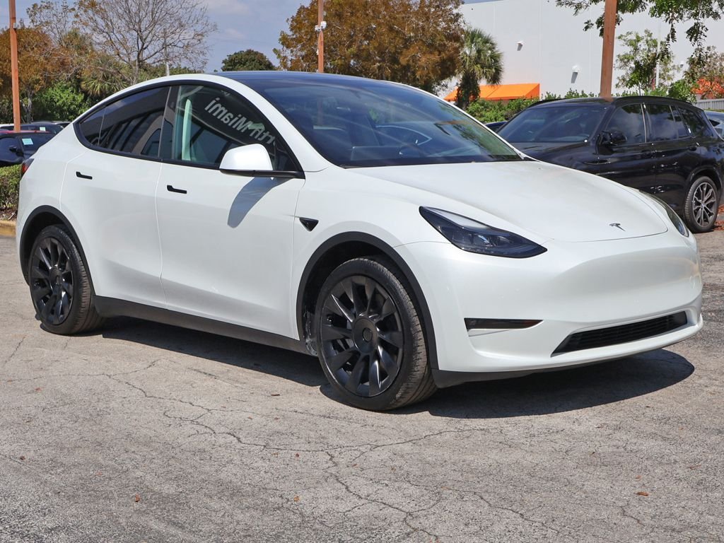Used 2024 Tesla Model Y Long Range with VIN 7SAYGDEEXRF025810 for sale in Miami, FL