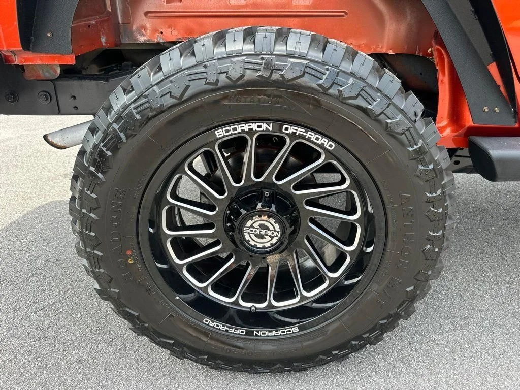 Used 2009 Orange Jeep Unlimited X image 13