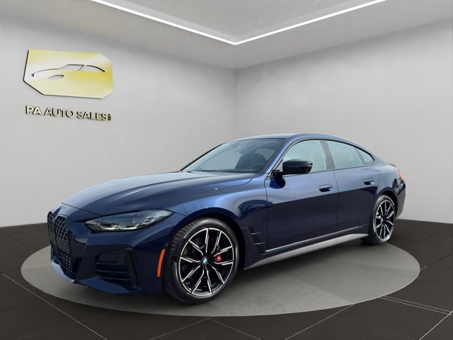 Used 2024 Tanzanite Blue II Metallic BMW 430i xDrive image 3