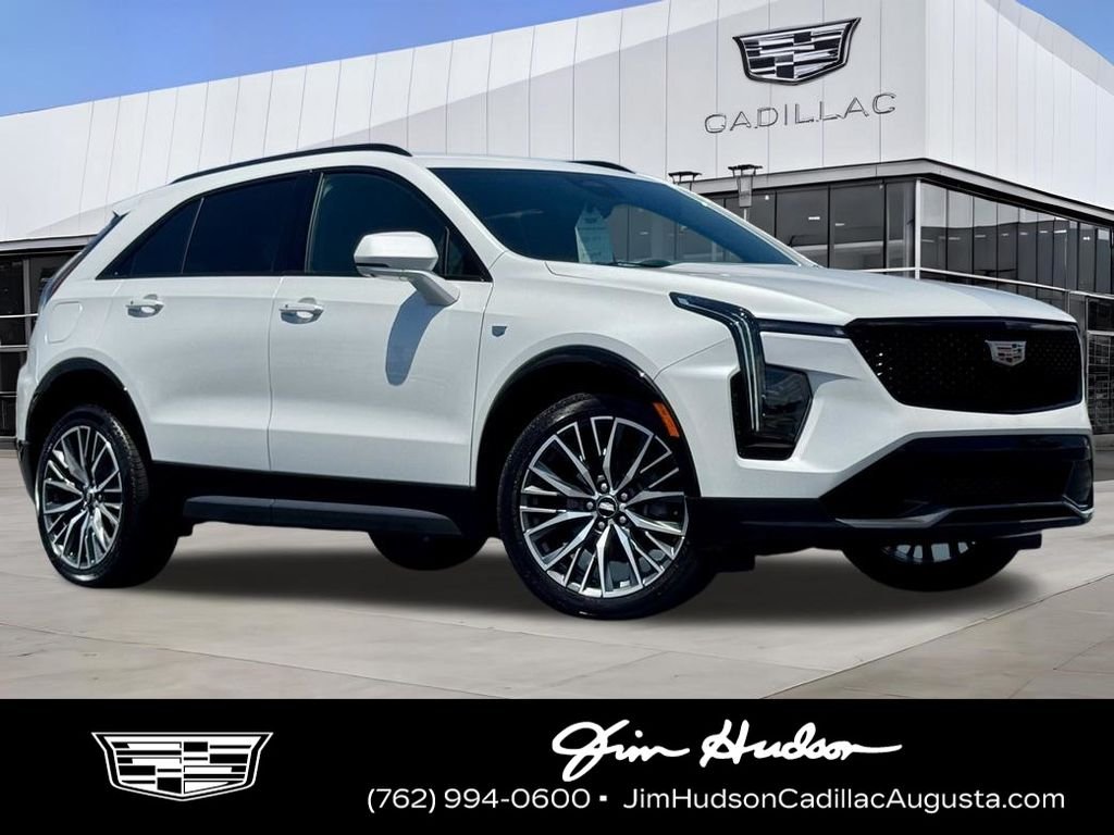 Used 2024 White Cadillac Sport image 1
