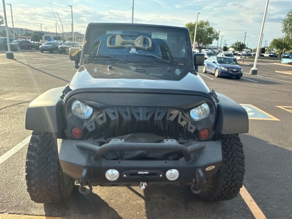 Used 2011 Black ClearCoat Jeep Unlimited Rubicon image 2
