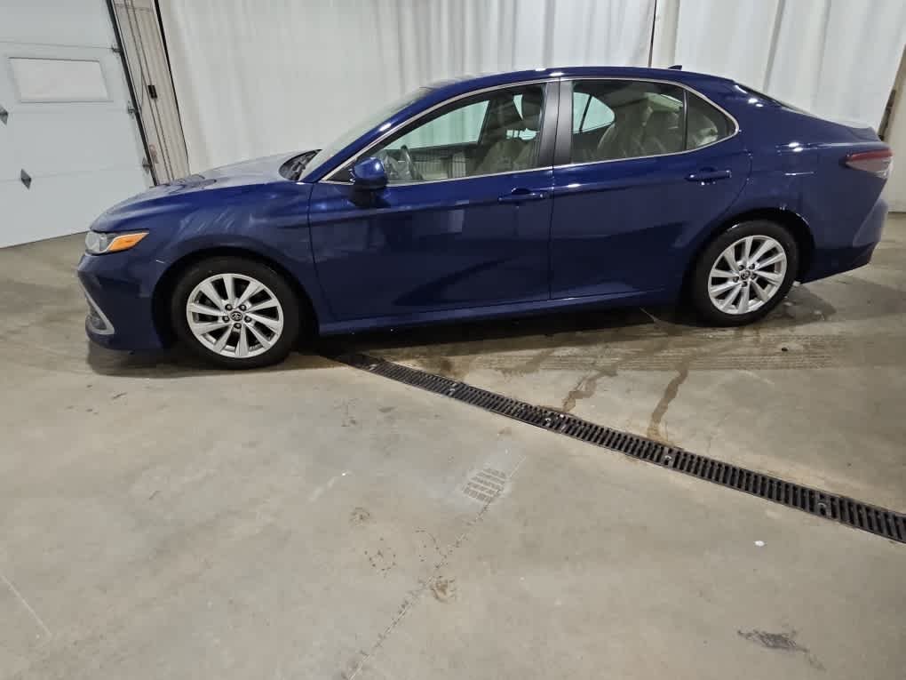Used 2023 Reservoir Blue Toyota LE image 2