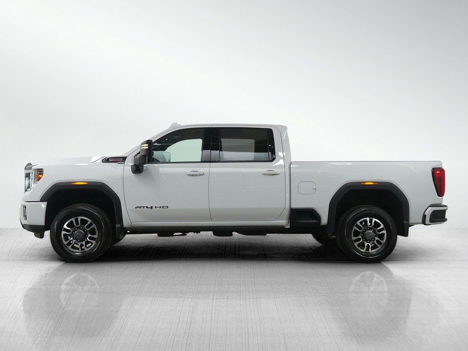 Used 2023 GMC Sierra 2500HD AT4 with VIN 1GT19PEY7PF232037 for sale in White Bear Lake, Minnesota
