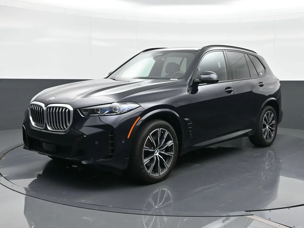 Used 2024 Black BMW xDrive40i image 1