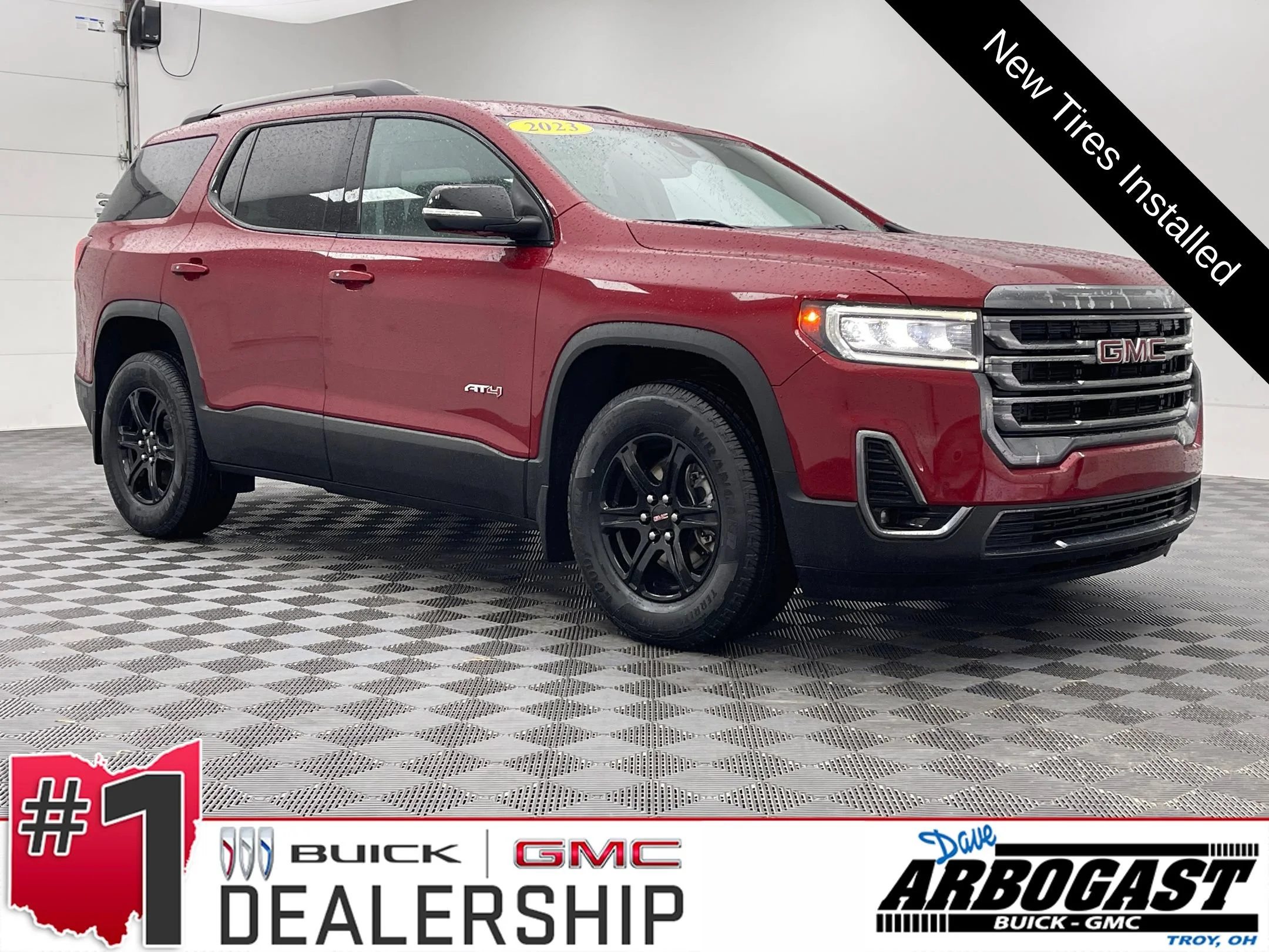 Used 2023 VOLCANIC RED TINTCOAT GMC AT4 image 1